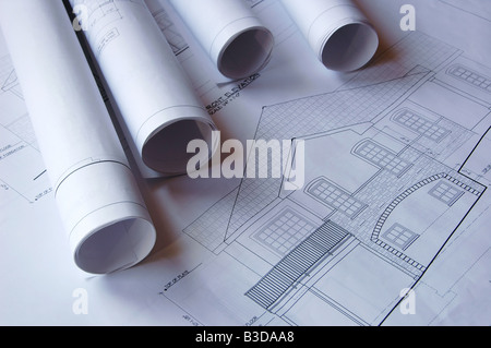 Blueprint di una casa e rotoli Foto Stock