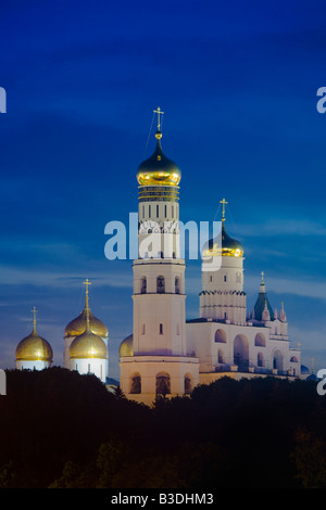 The Kremlin at night in Moscow Russia. Ivan the Great Bell Tower, with Assumption Belfry on the left. Stock Photo