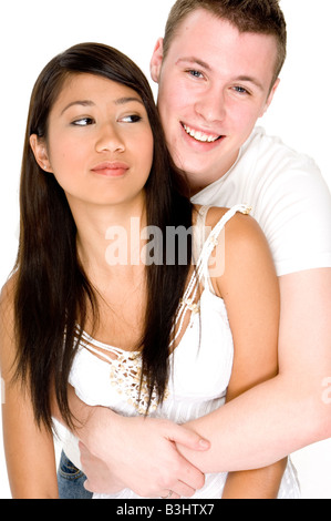 Gli adolescenti in amore in bianco su sfondo bianco Foto Stock