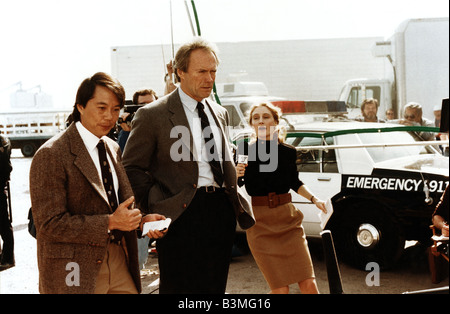 La piscina morto 1988 Warner/Malpaso film con da sinistra Evan C Kim, Clint Eastwood e Patricia Clarkson Foto Stock