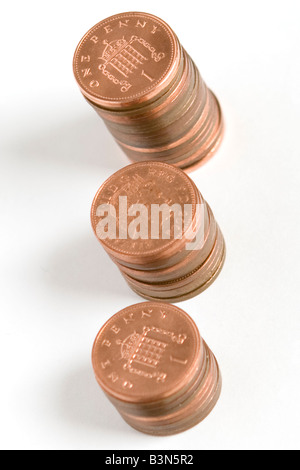 3 pile di 1 pence pezzi Foto Stock