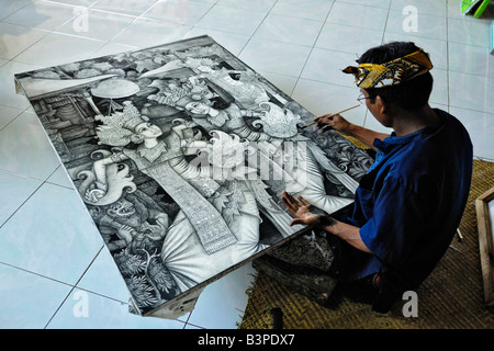 Artista con la pittura, co-operazione di pittori in Ubud, Bali, Indonesia Foto Stock