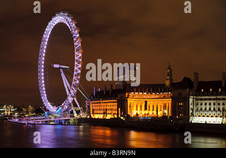 London Eye Millenium ruota di notte con il fiume Tamigi Foto Stock