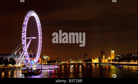 London Eye Millenium ruota di notte con il fiume Tamigi Foto Stock