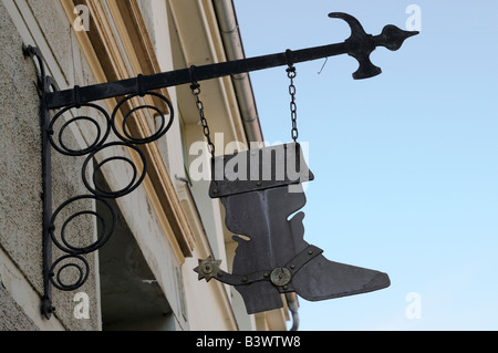 Westernstiefel Ladenschild gesehen a Wismar Deutschland Western boot shop segno visibile di Wismar in Germania Foto Stock