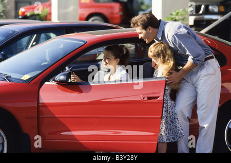 Famiglia shopping per auto, Miami Foto Stock