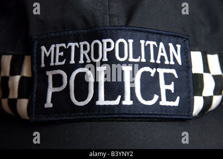 London Metropolitan Police armi da fuoco ufficiali berretto da baseball Foto Stock