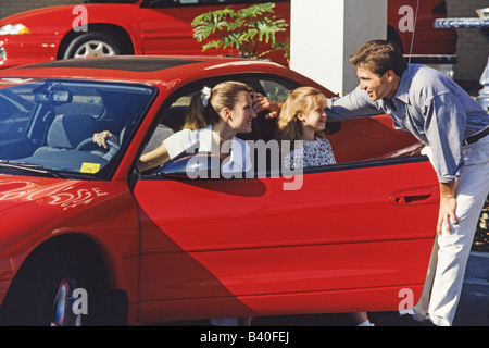 Famiglia shopping per auto, Miami Foto Stock