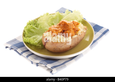 Pane appena sfornato jacket potato riempito di stile indiano piccante di pollo Tikka Masala Curry e nessun popolo Foto Stock