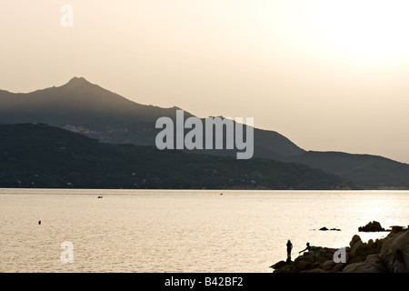 Tramonto nella baia della Biodola Isola d Elba Livorno ITALIA Foto Stock
