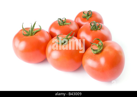 Pomodori maturi isolati su sfondo bianco Foto Stock