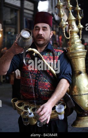 Acqua tradizionale venditore in Damasco, Siria Foto Stock