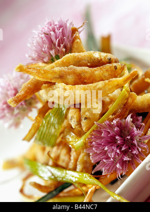 Fritte puzzava di pesce Foto Stock