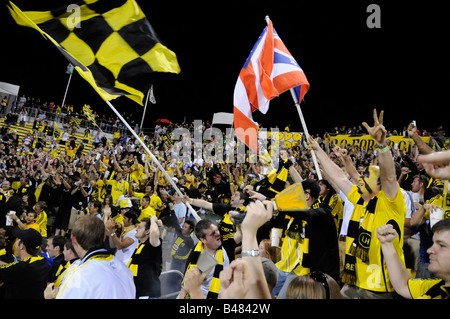 I fan del Columbus Crew celebrare un obiettivo Foto Stock