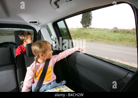 Viaggiare con bambini in circa Foto Stock