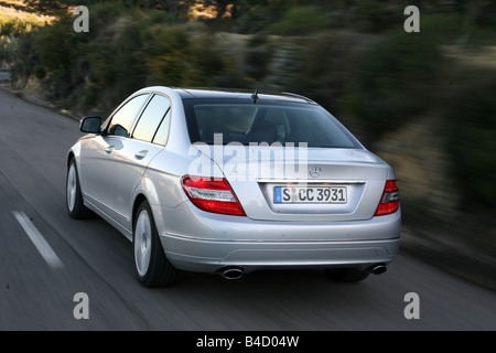 Mercedes Classe C, modello anno 2007, argento, guida, diagonale dal retro, vista posteriore, country road Foto Stock