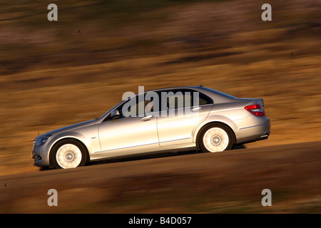 Mercedes Classe C, modello anno 2007, argento, guida, vista laterale, country road Foto Stock