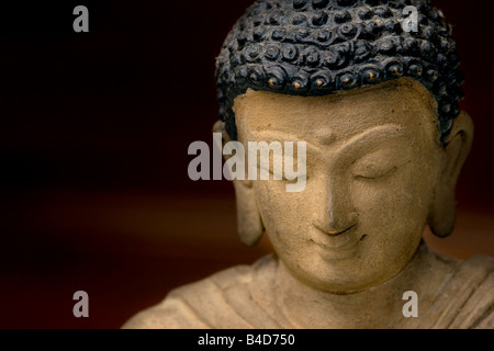 Vicino la foto di un volto di Buddha in bronzo dal Nepal Foto Stock