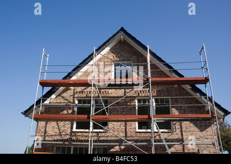 Casa di mattoni in costruzione - architettura tedesca Foto Stock
