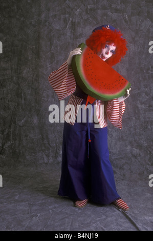Clown con cocomero Foto Stock