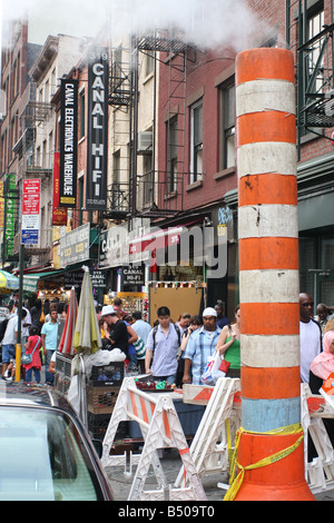 Una scena caotica su Canal Street, New York City Foto Stock