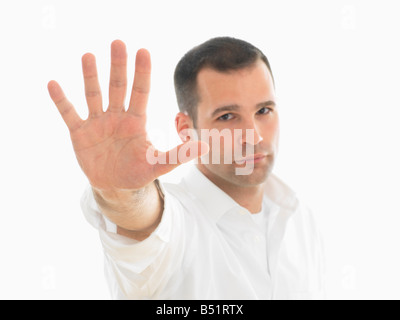 Ritratto di uomo con mano tesa Foto Stock