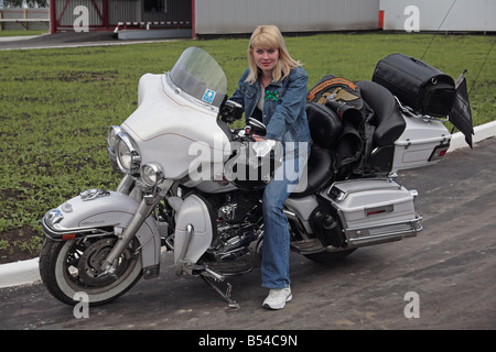 La Harley della ragazza Foto Stock