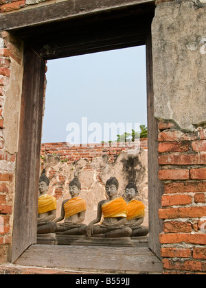 Figure di Buddha in le antiche rovine della città del Patrimonio Mondiale Unesco in Ayutthaya Thailandia Foto Stock