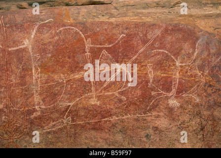 Warrior il fregio all'arte rupestre degli Aborigeni sito a Ubirr Rock, il Parco Nazionale Kakadu, Territorio del Nord, l'Australia Foto Stock