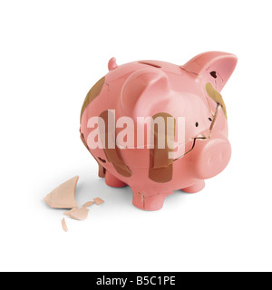 Incrinato salvadanaio coperto di intonaci Foto Stock