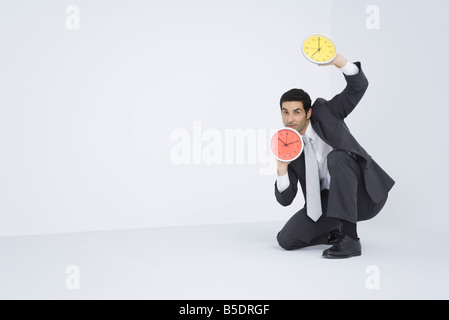 Imprenditore in grado di contenere fino a due orologi Foto Stock