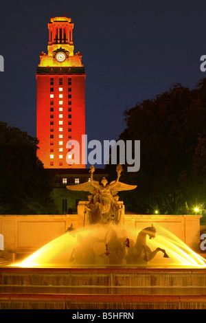 University of Texas Tower lit orange & the number 1, after winning the 2005 National Championship, Littlefield Fountain in front Stock Photo