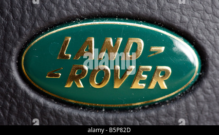 Il costruttore di auto Land Rover, visto qui in forma di società il logo sul volante. Foto Stock