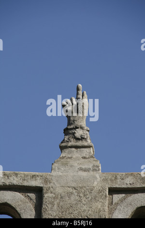 Scultura a mano sul tetto di Sant' Anastasia monastero, Roma Foto Stock