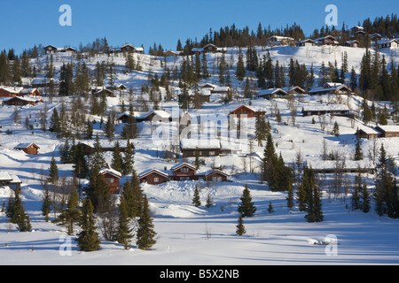 Chalets per le vacanze sul pendio nevoso Valdres Norvegia Foto Stock