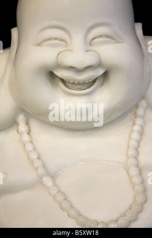 Ridendo scultura di Buddha Foto Stock