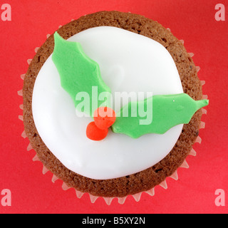 Natale HOLLY CUPCAKE TETTUCCIO Foto Stock
