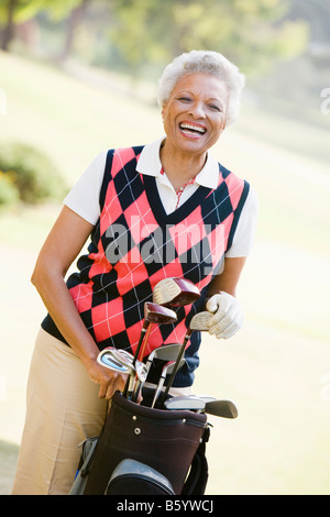 Ritratto di un giocatore di golf femminile Foto Stock