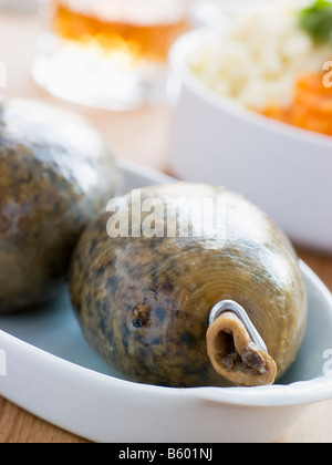 Tutto Haggis con Neeps Tatties e whisky Foto Stock