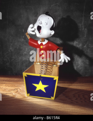 Un molto stanco 'Jack in un box' che scaturisce dalla sua scatola. Foto Stock