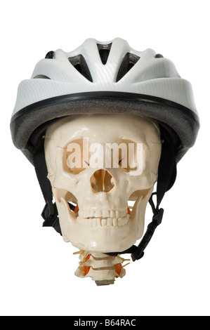 Cranio umano in bici casco Foto Stock