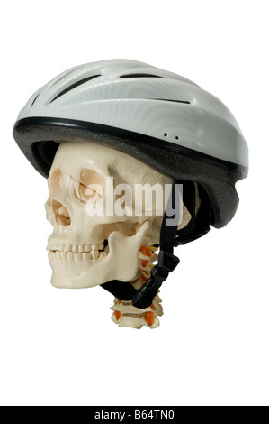 Cranio umano in bici casco Foto Stock