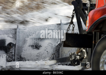 Snow Plough carrello in azione Foto Stock