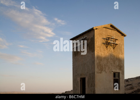 Africa Namibia Kolmanskop impostazione luci sun decadendo edificio nella città fantasma di diamante abbandonate città mineraria Foto Stock