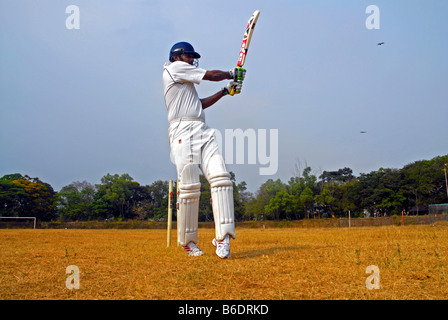 Un giocatore di cricket Foto Stock