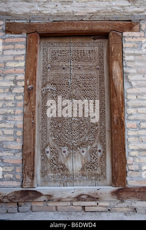 Porta di ingresso di casa a Khiva città vecchia, Itchan Kala, Uzbekistan Foto Stock