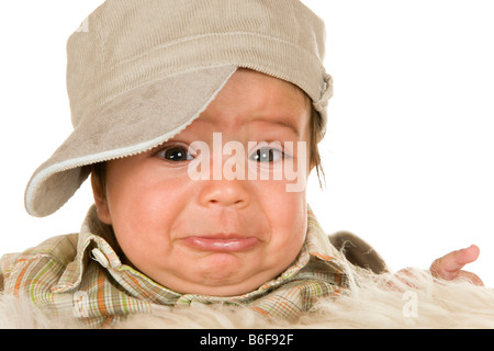 Baby, 4 mese-vecchio, iniziando a piangere Foto Stock