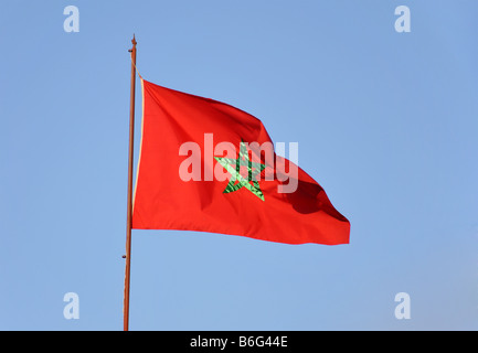 Bandiera nazionale del Marocco sventolare nel vento Foto Stock