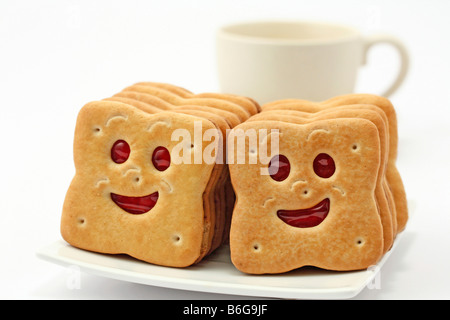 Sorridente e cookie cup Foto Stock