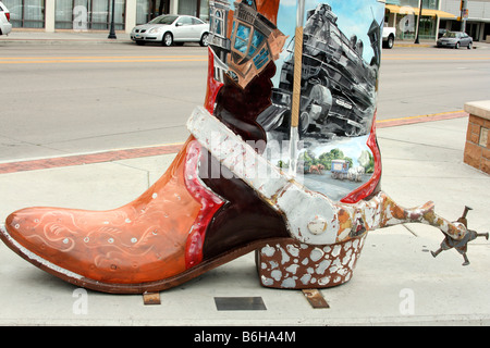 Scultura di stivali Cowboy nel centro di Cheyenne, Wyoming, Stati Uniti Foto Stock